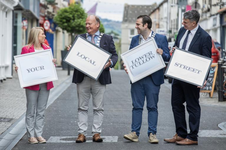 4 People with Signs