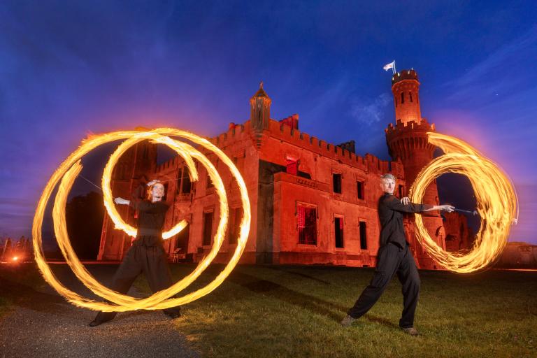 2 men fireballs and castle