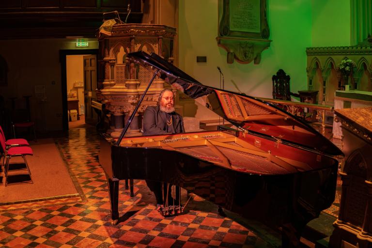man playing piano