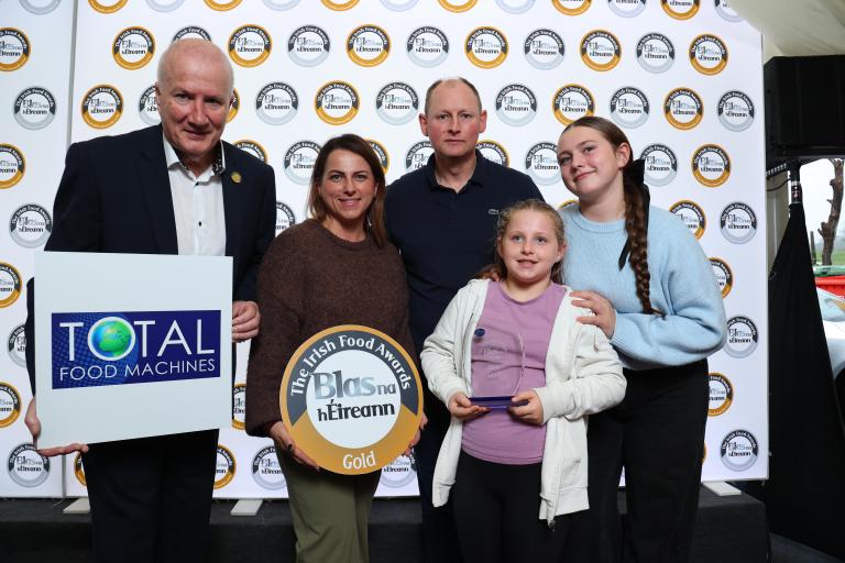 Group of people with award