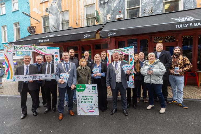 Group standing outside a pub