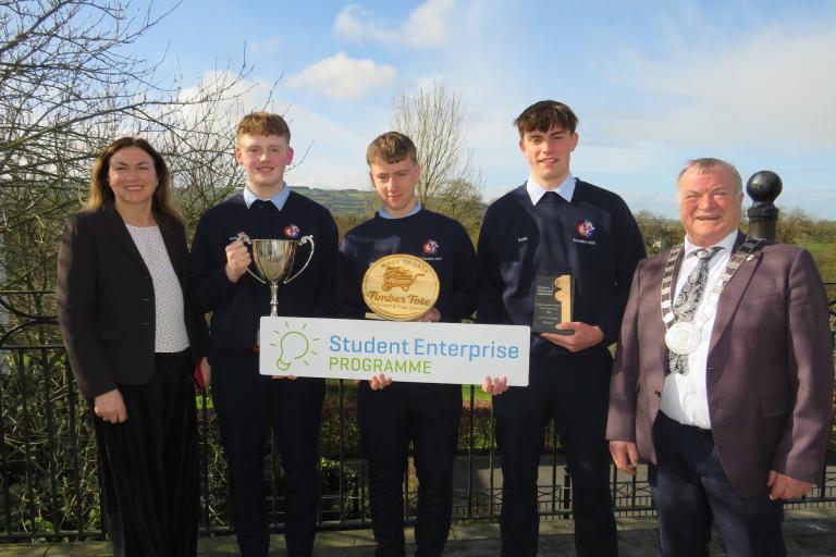 Group of boys with Sign 