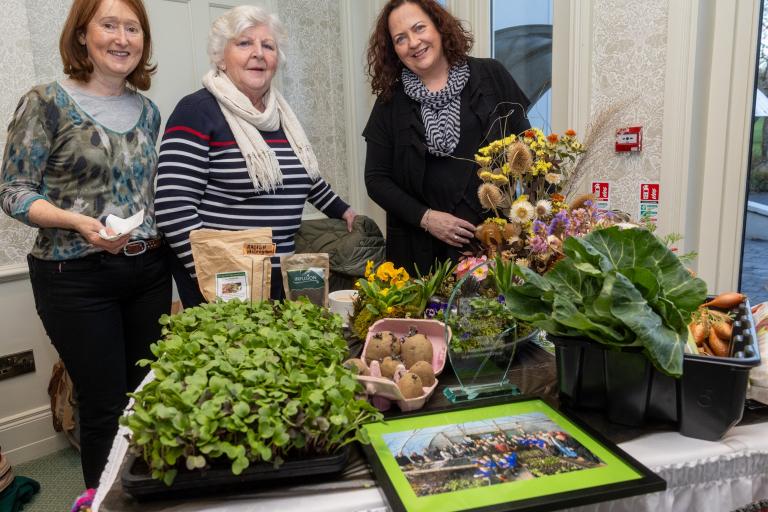 Flower arrangement and people