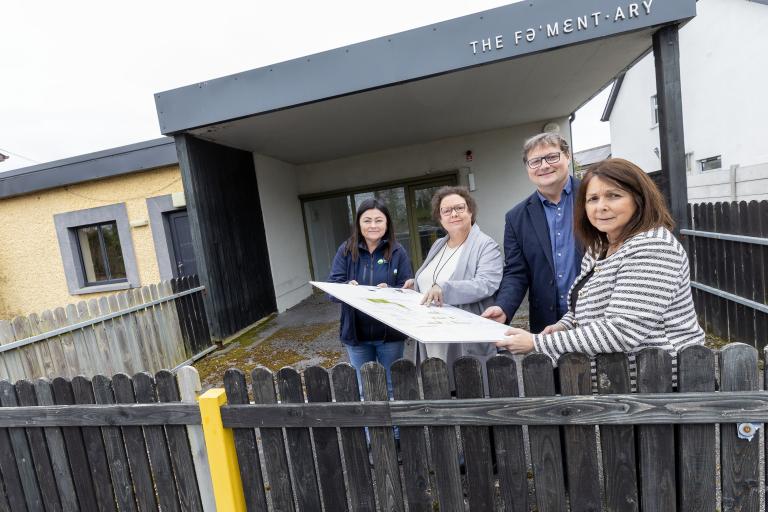 Group Standing at Fence