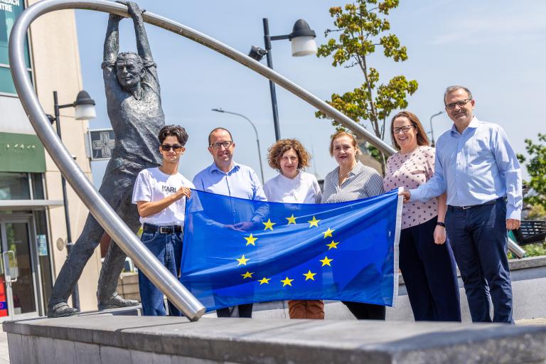 Group holding the EU Flag