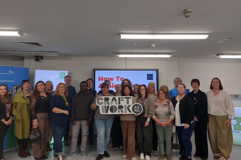 Group holding a sign