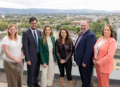 6 People standing on roof balcony