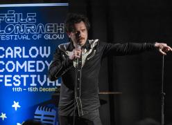 Man on stage with microphone