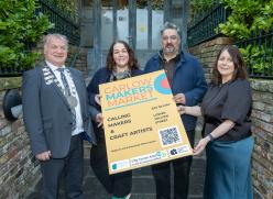 People holding a sign