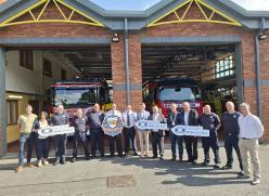 People standing outside firestation