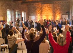 Group with arms in the air