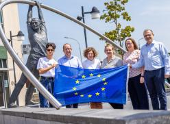 Group holding the EU Flag