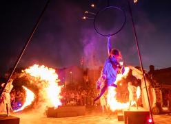 Woman with hoop and circles of fire