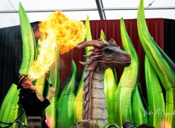 Dragon and man breathing fire