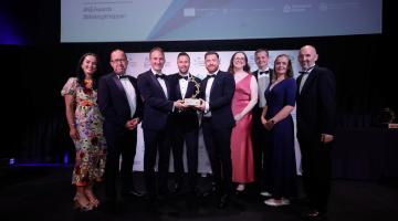 Group accepting award