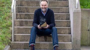 Man Sitting on Steps