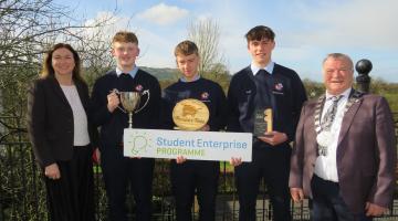 Group of boys with Sign 