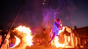 Woman with hoop and circles of fire